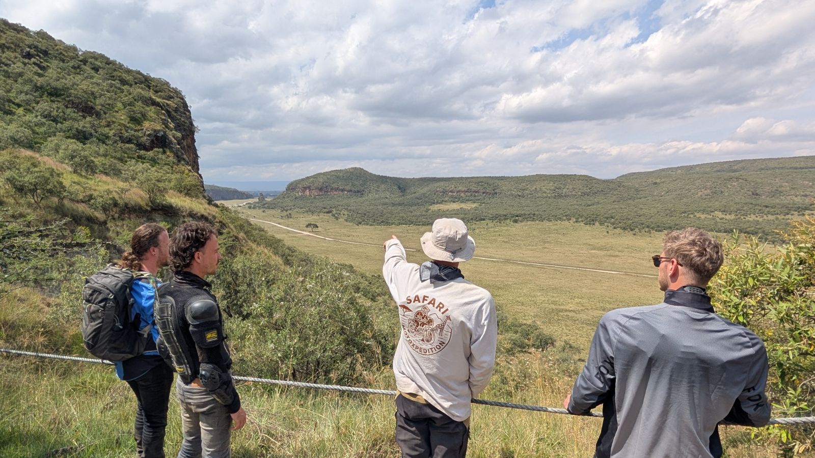 Safari MotoXpedition guide pointing out the route over Hell's Gate National Park in green season